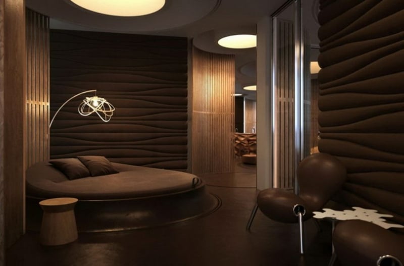 couleur-chambre-moderne-murs-tapissés-marron-lit-rond-plafonniers-modernes couleur de chambre