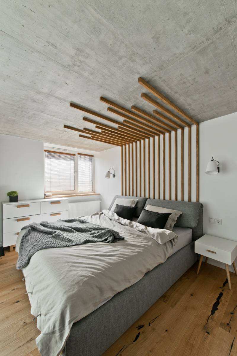 Mobilier scandinave en gris, blanc et bois d'un loft nordique