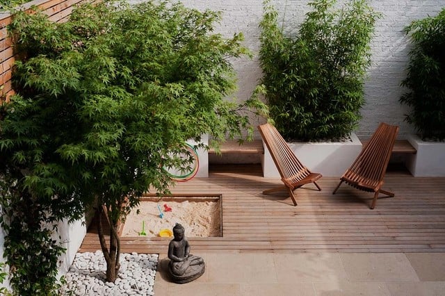 aménagement de jardin statue-buddha-plante-de-bambou