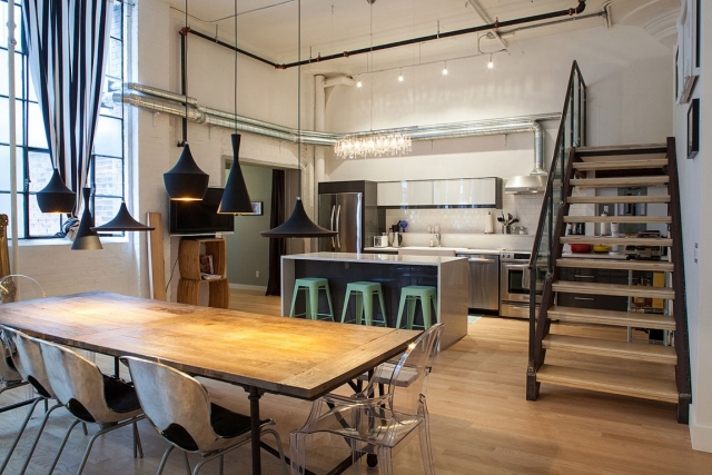 cuisine ouverte moderne escaliers table chaises îlot cuisine appartement de luxe moderne