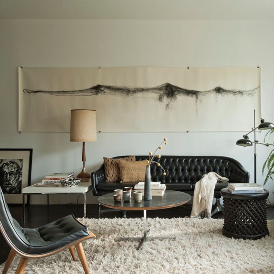 aménagement-salon-mixte-style-rétro-moderne-canapé-capitoné