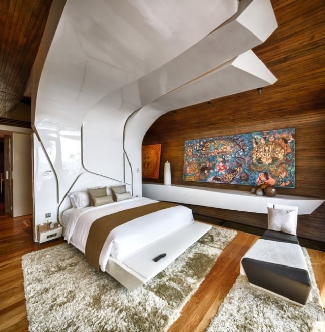 chambre-coucher-adulte-luxe-lit-décoration-moderne-futuristique-lambris-bois