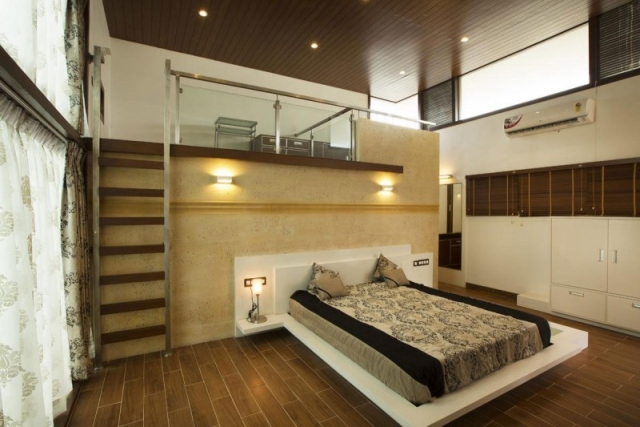 chambre-coucher-type-loft-design-moderne-lambris-plafond-éclairage-LED