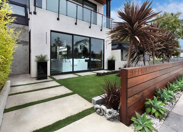 clôture en bois maison-moderne-palmier-plantes