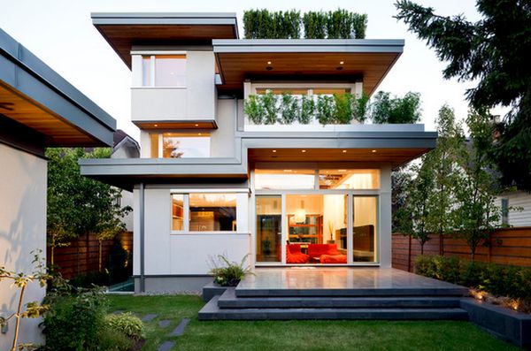 clôture en bois maison-moderne-plantes-terrasse