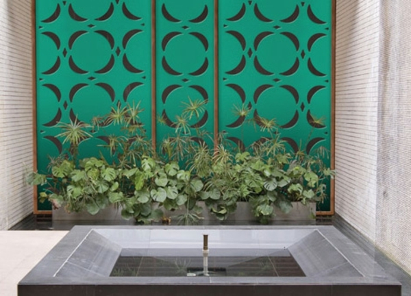 clôture-jardin-métal-peint-vert-ornements-déco-sympa