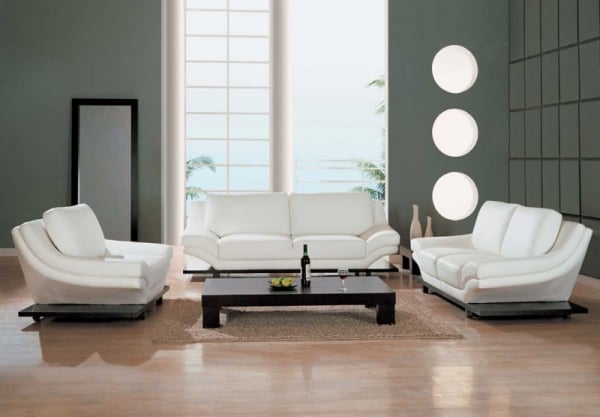 salon-blanc-moderne-sofa-fauteuls-blancs-table-bois