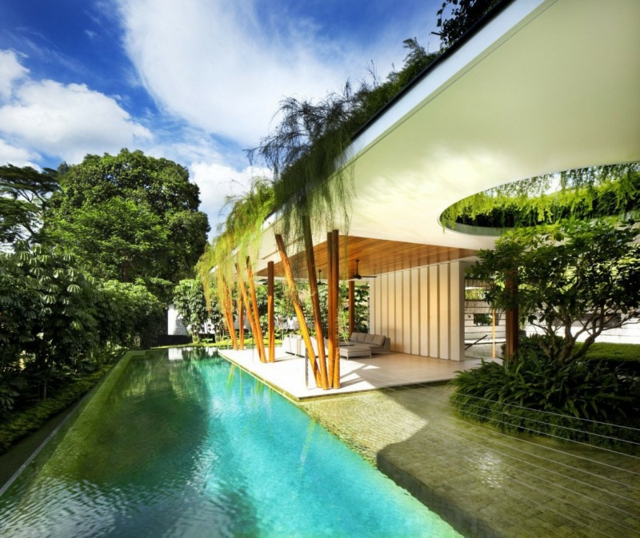 piscine-extérieure-débordement-maison-jardin-toit-terrasse