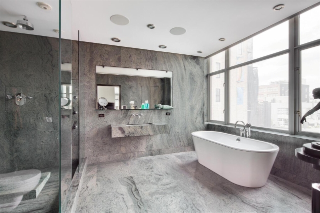 25-designs-luxueux-élégants-modèle-salle-bain-baignoire-blanche-forme-ovale-revêtement-effet-pierre