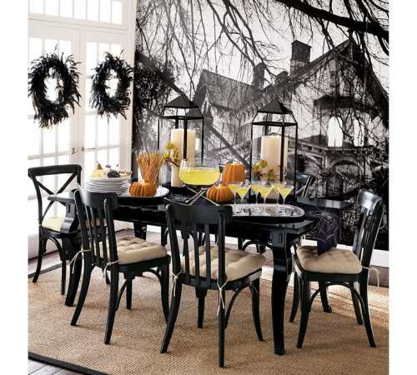 décoration-Halloween-table-idées-uniques-designers-couronnes-plumes-noires-citrouilles décoration Halloween de table