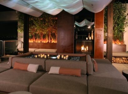 аménagement-de-terrasse-idée-originale-canapé-cheminée