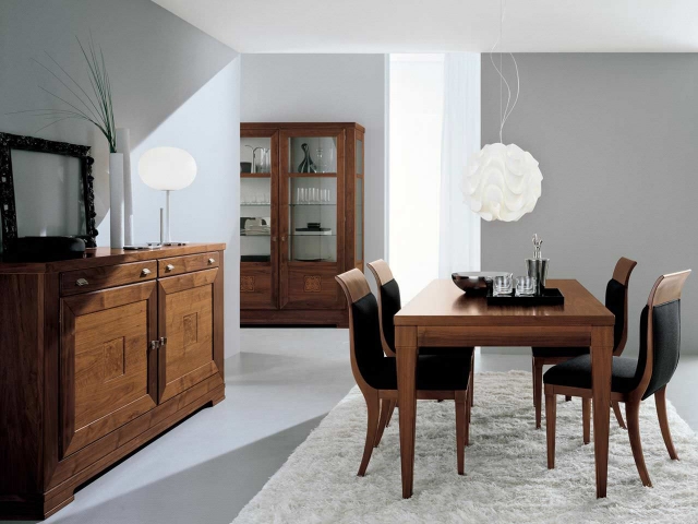 salle-manger-contemporaine-suspension-blanche-élégante-mobilier-bois-chaises-tapissées-buffet