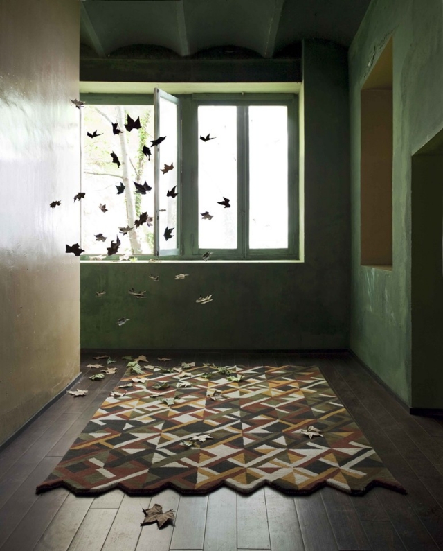 tapis contemporain tapis-contemporain-design-22-idées-originalité-laine-Gandia-Blasco-motifs-géométriques-triangles-marron-blanc-jaune