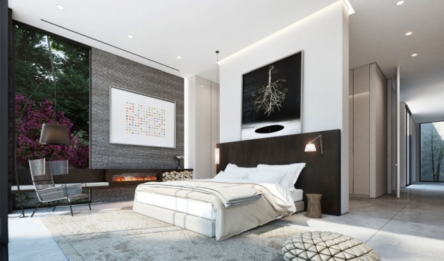chambre-coucher-moderne-tepte-lit-marron-sombre-lampe-sol-élégante-cheminé-moderne-fauteuil-élégant chambre à coucher contemporaine