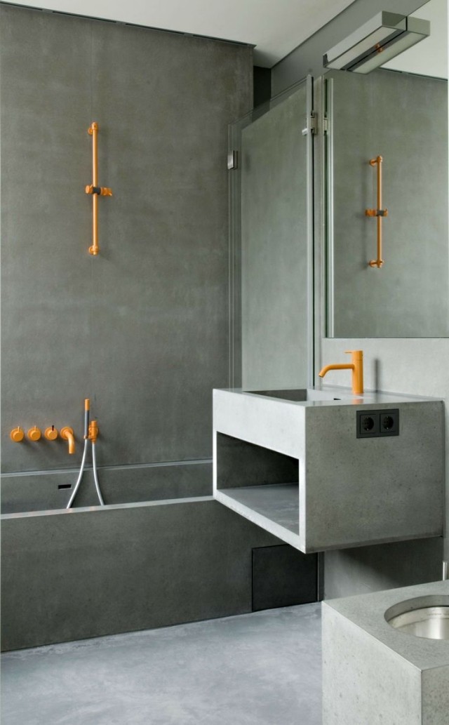 design-salle-bains-moderne-béton-éléments-oranges