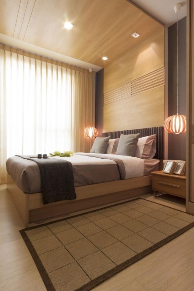 idées-de-déco-chambre-coucher-grand-lit-coussins-luminaire
