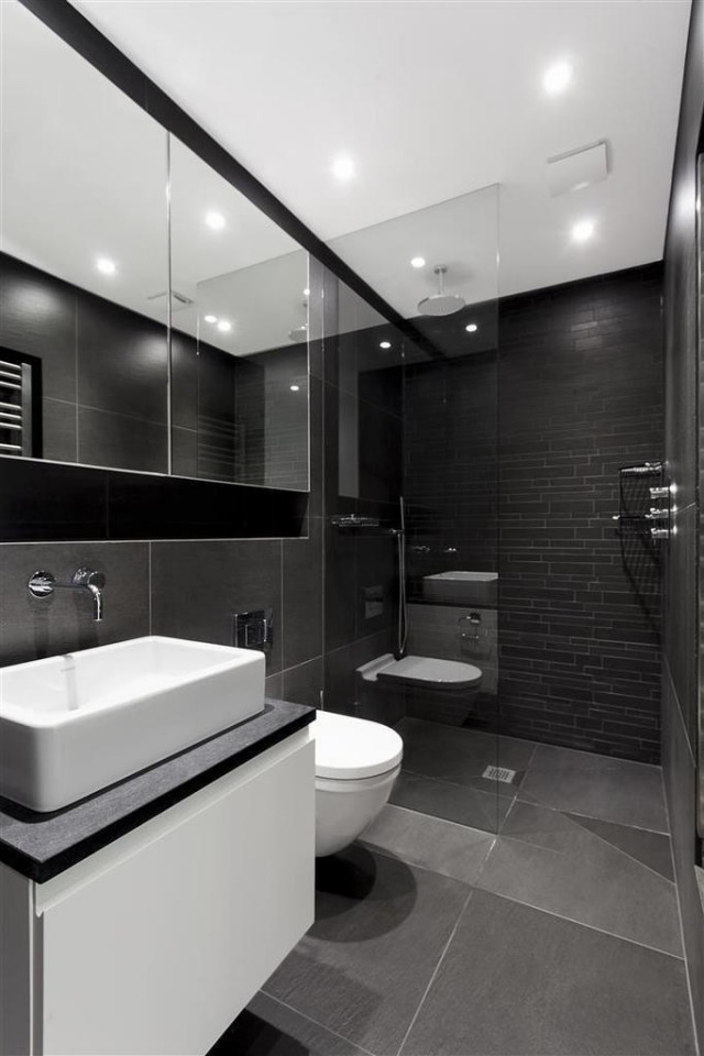 salle-bains-moderne-carrelage-mural-sol-noir-gris-miroirs-modernes-vasque-blanche-meuble-vasque-blanc photos de salle de bains