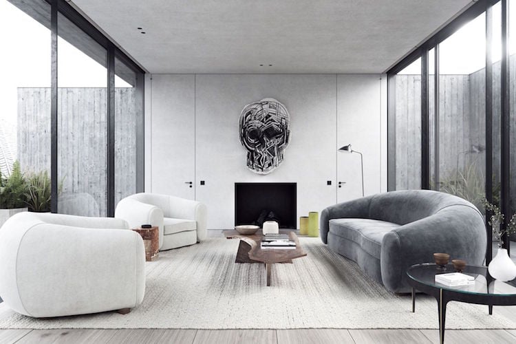 salon minimaliste canape gris fauteuils blancs design ovale cheminee point focal