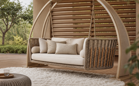 Balancelle de jardin design WABI en corde tressée avec canapé suspendu sur terrasse luxueuse
