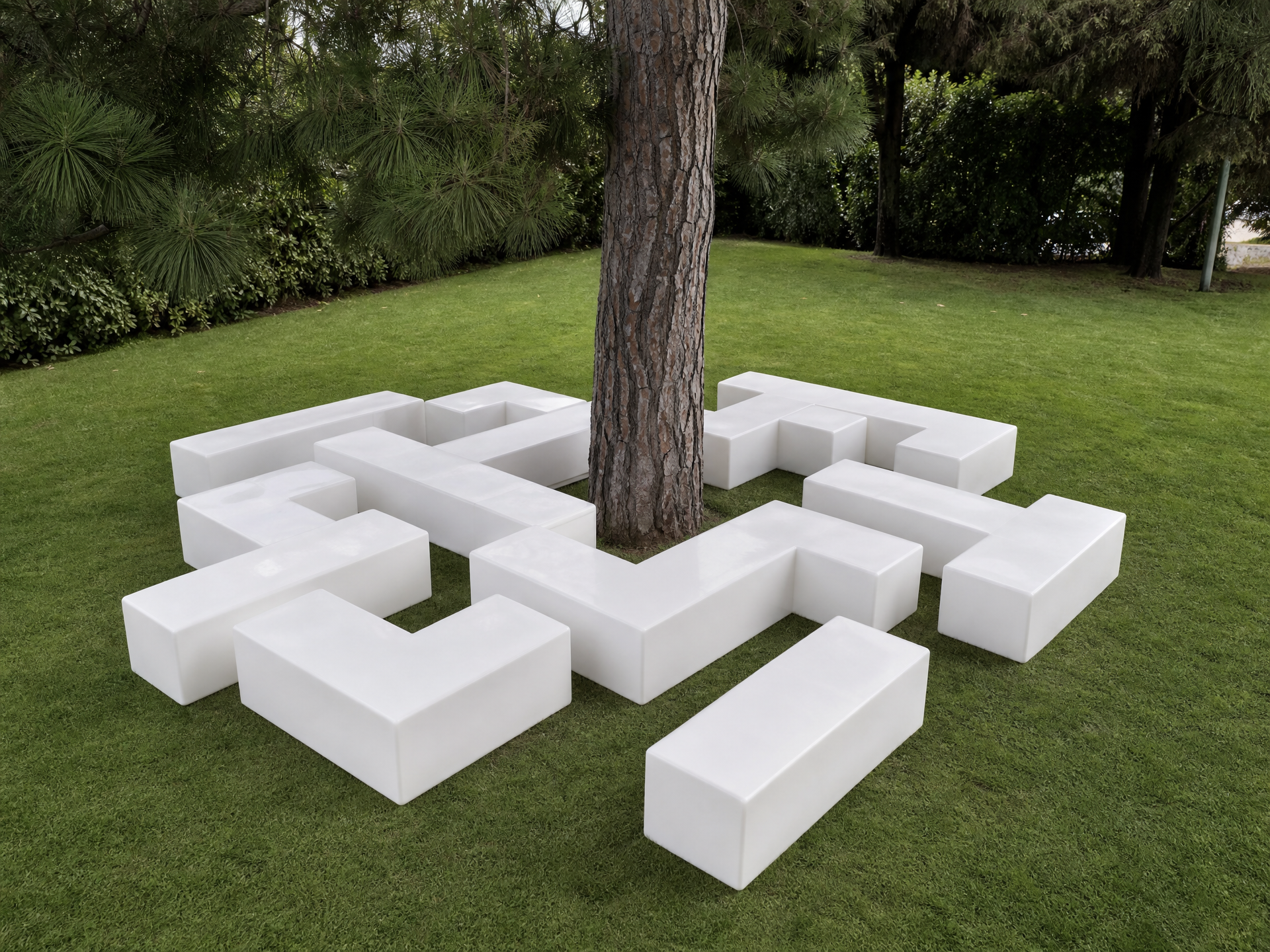 Banc de jardin modulaire blanc en polyéthylène autour d'un arbre