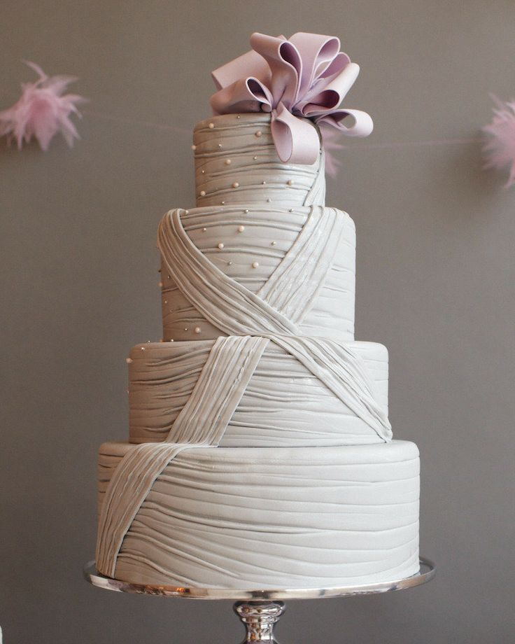buffet de mariage sucré gâteau 4-étages rubans mauve pastel