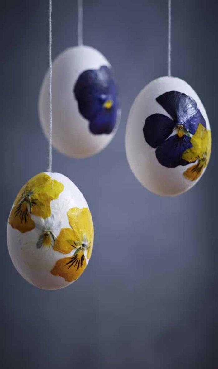 décoration vintage œufs Pâques pensées jaunes violettes
