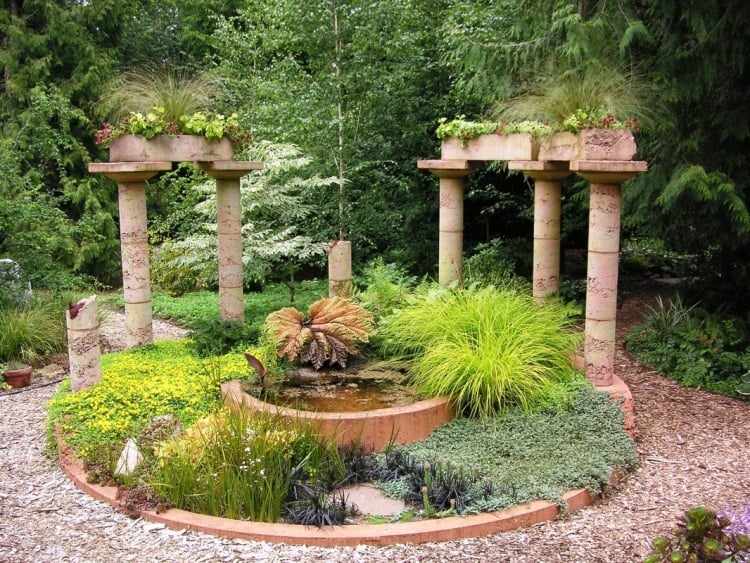 entretien-jardin-moderne-gravier-décoratif-galets-plantes-vertes