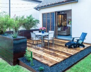 jardin-terrasse-revetement-sol-bois-coin-repas-chaise-longue
