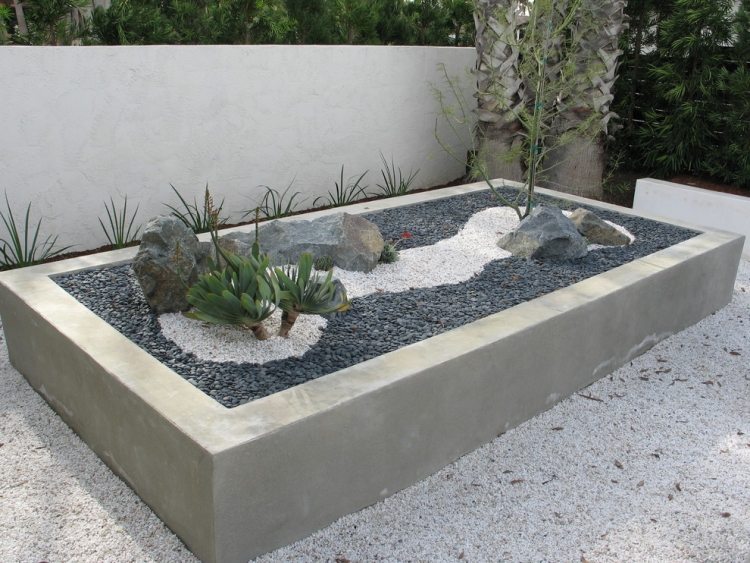 jardin zen pierraille grise roches plantes