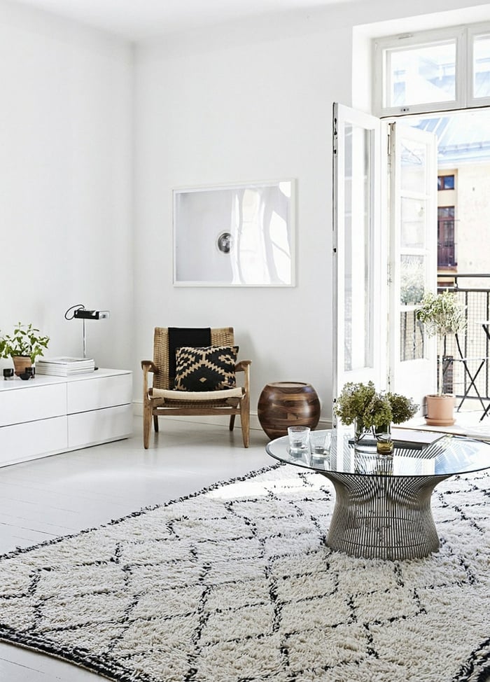 salon design scandinave table basse fauteuil tapis motifs