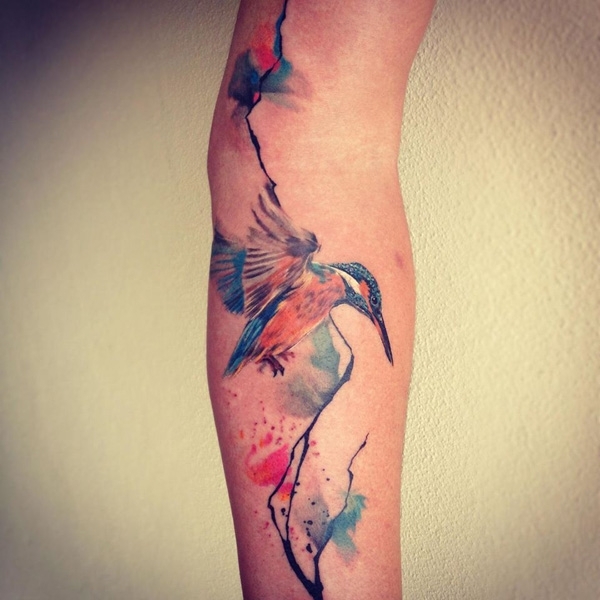tatouage-avant-bras-oiseau-montagnes