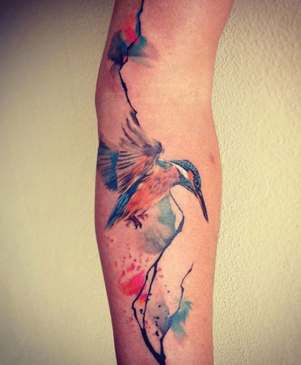 tatouage-bras-avant-bras-style-aquarelle-colibri