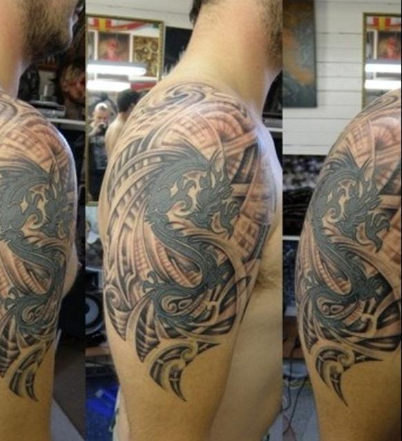 tatouage-dragon-tribal-épaule-bras-homme
