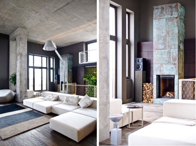 loft-deco-industriel-murs-bétonèexposés-cheminée-canapé