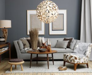 peinture-grise-salon-moderne-ensemble-canape-coussins-table-ronde