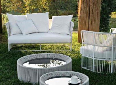 meubles-de-jardin-table-basse-ronde-canape-droit-coussins