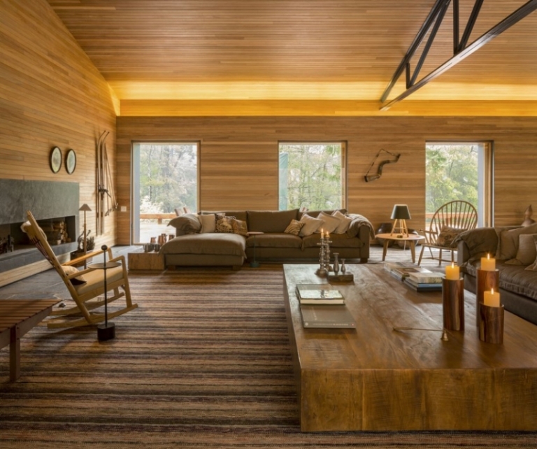 deco-interieur-revêtement-bois-éclairage-indrect-cheminée-table-bois-massif