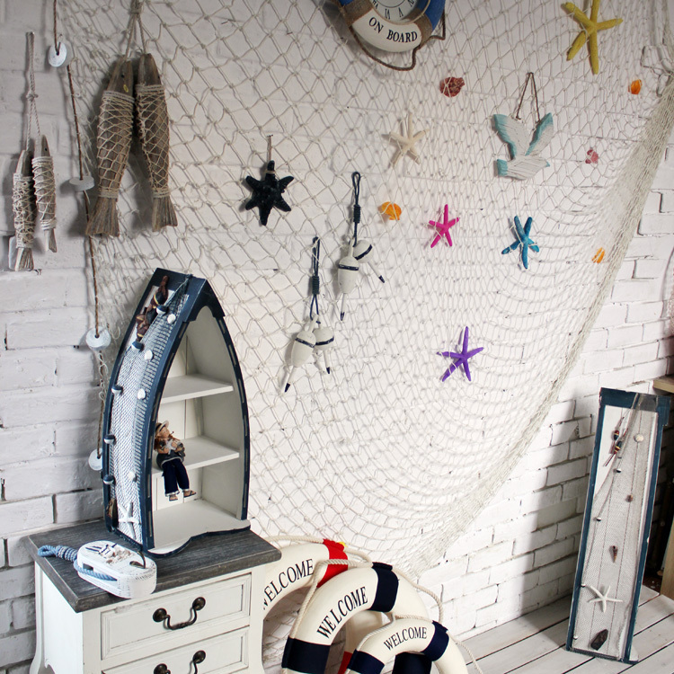 filet de pêche, poissons en bois et étoiles de mer pour une décoration marine chic filet-pêche-poissons-bois-étoiles-mer-décoration-marine-chic