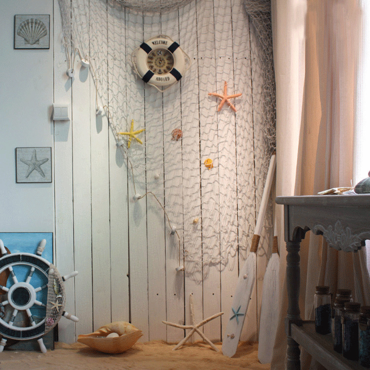 filet de pêche, étoiles de mer, barre à roue et bouée de sauvetage marine filet-pêche-étoiles-mer-barre-roue-bouée-sauvetage-marine