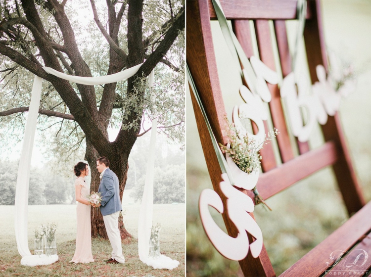 idees-decoration-mariage-chaise-noms-mariés-voile-blanc-vases-fleurs