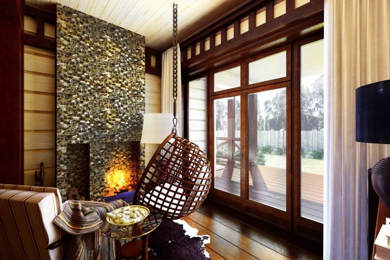 interieur-design-moderne-habillage-cheminée-pierre-panneaux-bois-chaise-suspendue