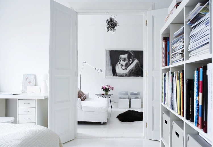 meuble-salon-blanc-canapé-sol-résine-bibliothèque-tableau-noir mobilier de salon