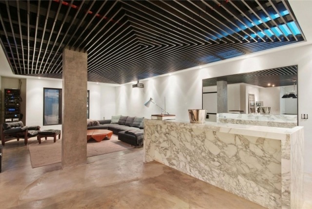 plafond design bar-marbre-canape-angle-table-ronde-revement-sol