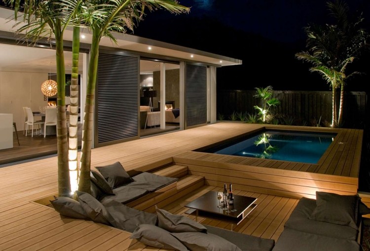 amenagement-jardin-terrasse-piscine-bancs-coussins-gris-palmiers aménagement de jardin et terrasse