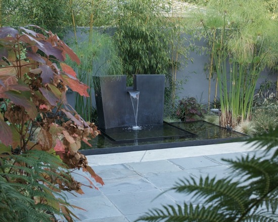 cascade-jardin-moderne-pierre-noire-acier-inoxydable