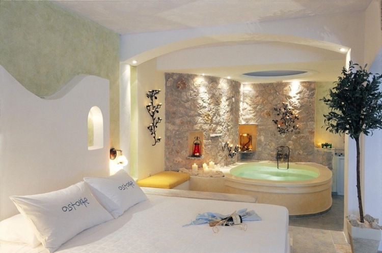 chambre avec jacuzzi romantique-murs-pierre-bougeoirs