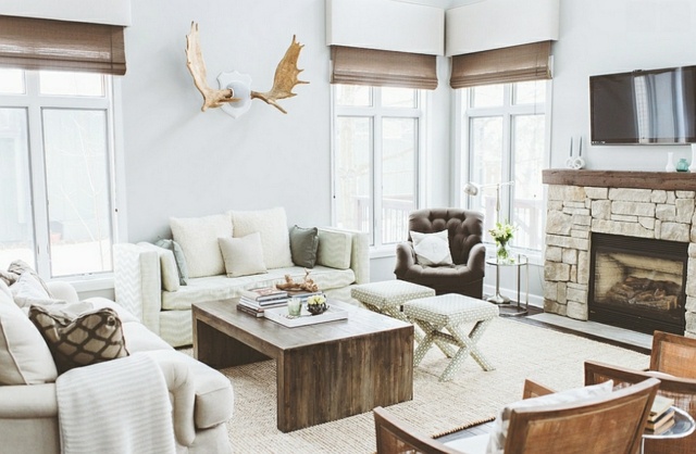 décoration-intérieur-salon-style-chic-rustique-bois-cerf-cheminée-pierre