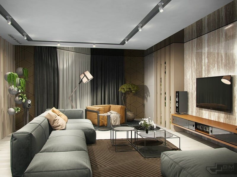 meubles-gris-appartement-salle-séjour-canapé-ottoman-gris-tapis-marron-fauteuil-orange
