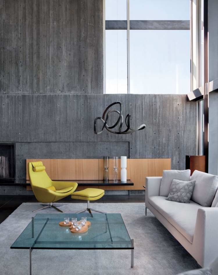 salon-contemporain-murs-béton-gris-brut-fauteuil-jaune