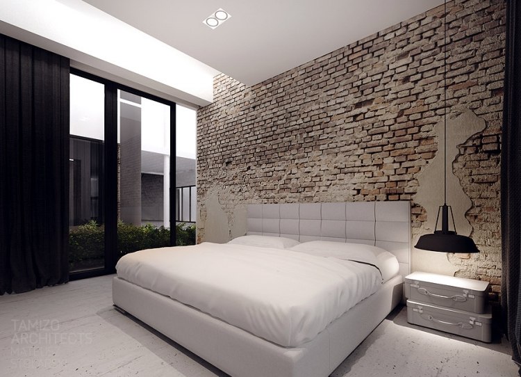 2architecture-interieure-moderne-chambre-coucher-mur-brique-suspension-noire-tete-lit-blanche-kler-tamizo architecture intérieure